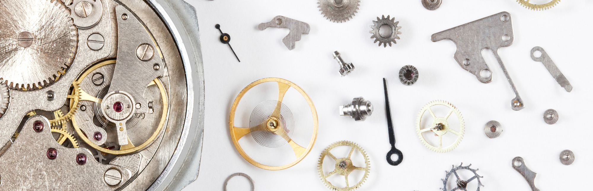 Ultrasonic cleaning systems for watch and jewelry parts